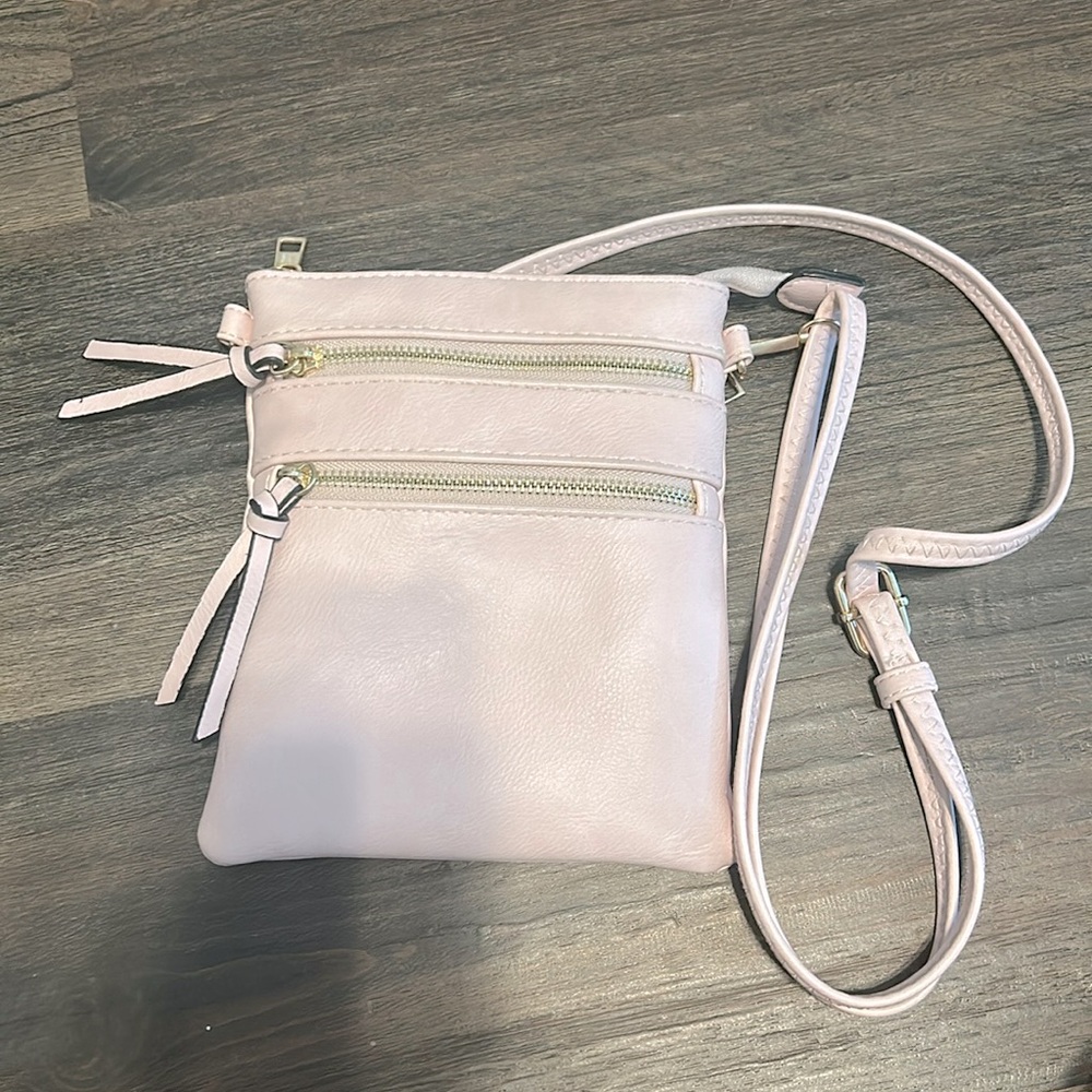 Baby pink purse with gold accents